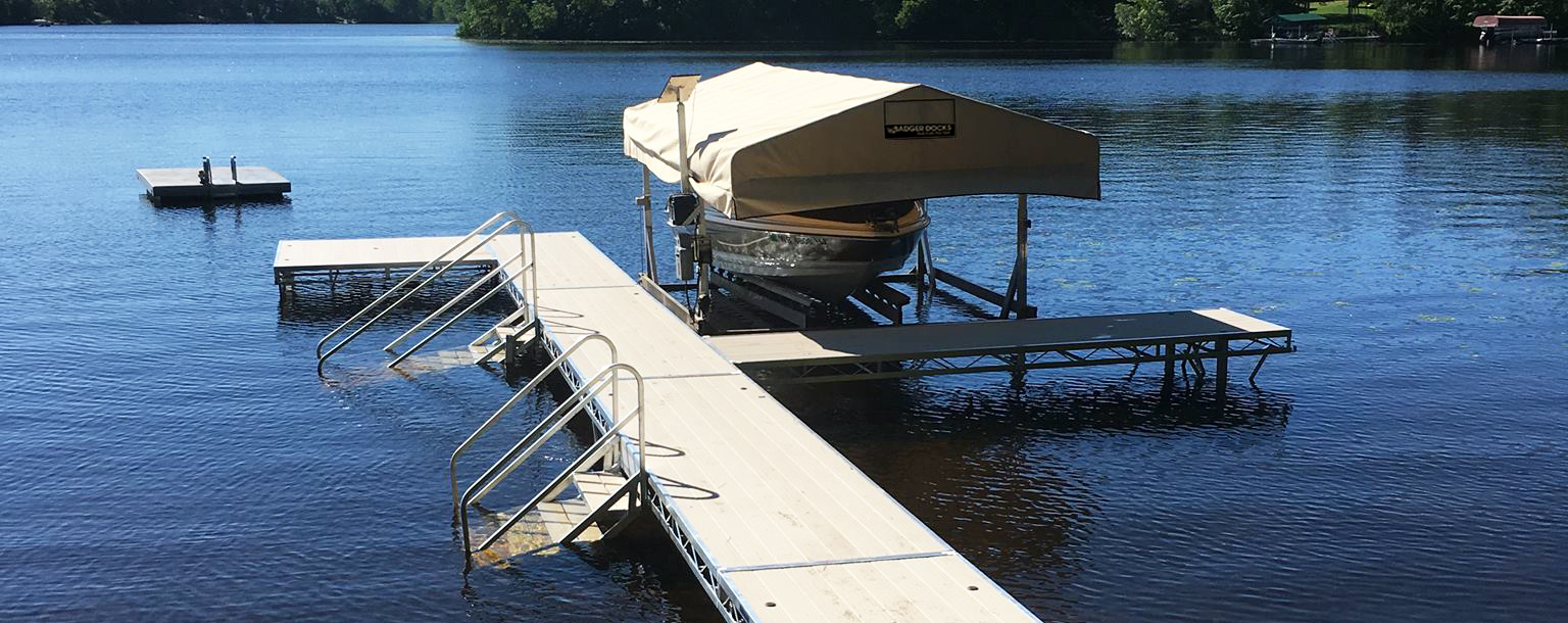 New dock and lift housing an expensive boat